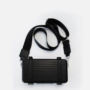 Brand new black Luggage like cross body bag